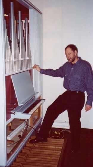 Steen Larsen in front of the partially assembled organ